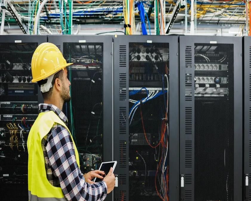 Engineer working in a data center
