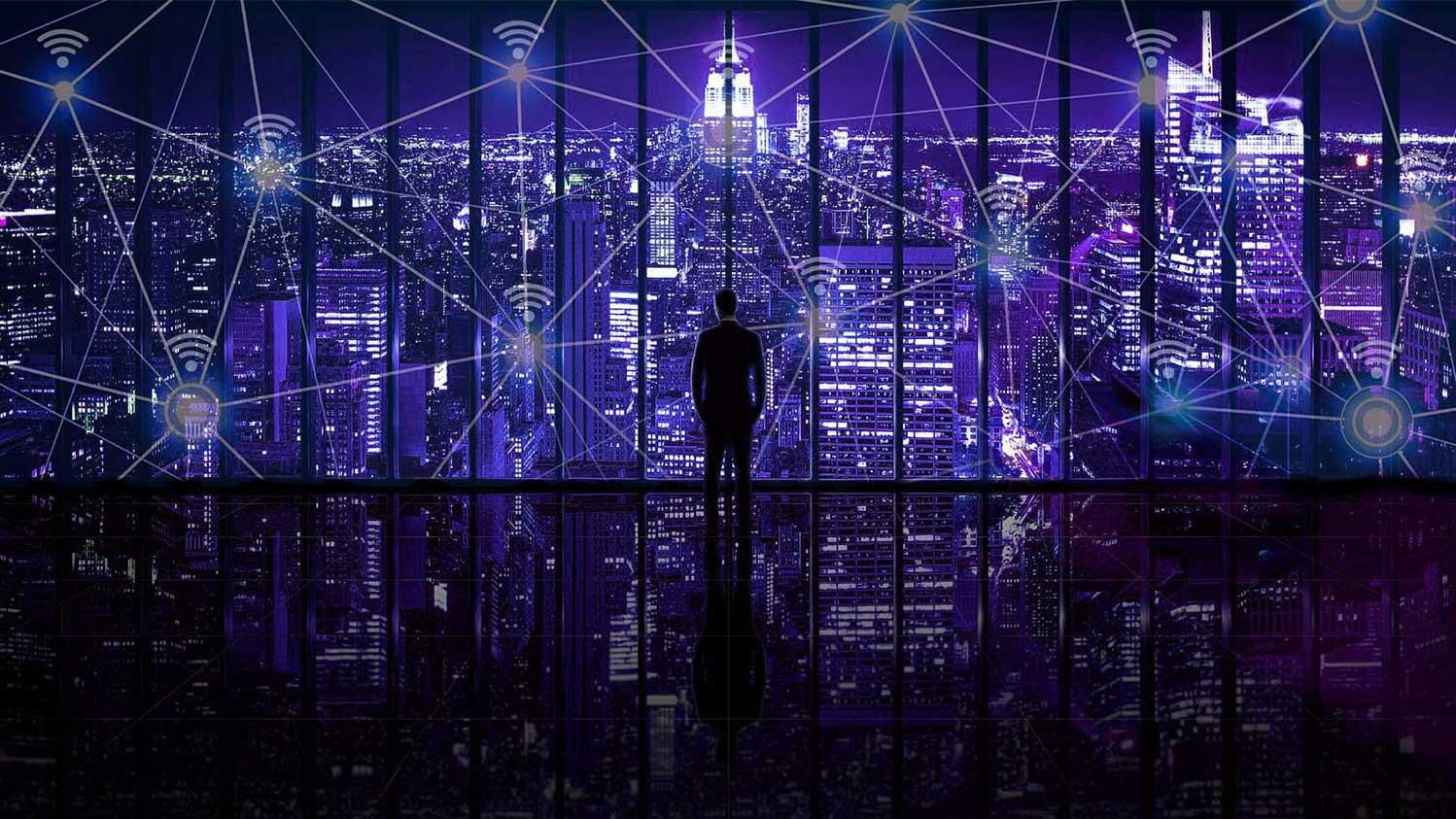 Connected smart city skyline at night